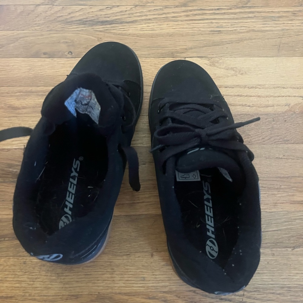 Heelys boys (wheelies) size 4 like new, barely worn.